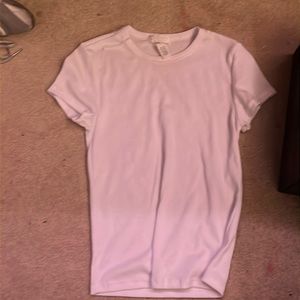 This shirt is from Tilly’s. It is a Small. It is 60% cotton and I never worn it.